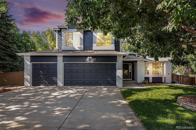 9924 Silver Maple Way, Highlands Ranch, CO 80129 - view of front of home featuring driveway, an attached garage, and brick siding