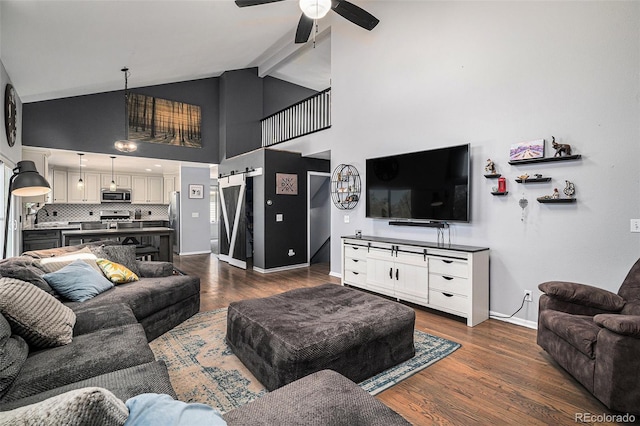 9924 Silver Maple Way, Highlands Ranch, CO 80129 - living area with ceiling fan, dark wood-style floors, beam ceiling, and high vaulted ceiling