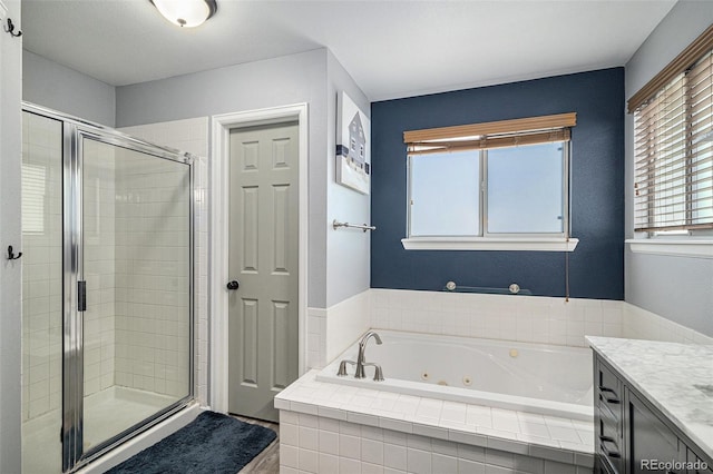 9924 Silver Maple Way, Highlands Ranch, CO 80129 - bathroom with a whirlpool tub, a shower stall, and vanity