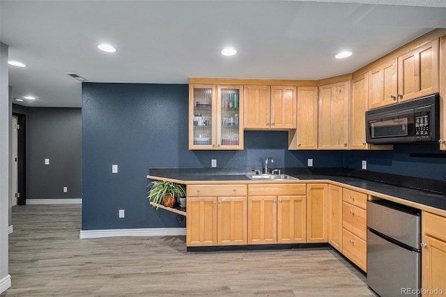 9924 Silver Maple Way, Highlands Ranch, CO 80129 - kitchen featuring black microwave, freestanding refrigerator, light wood finished floors, dark countertops, and recessed lighting