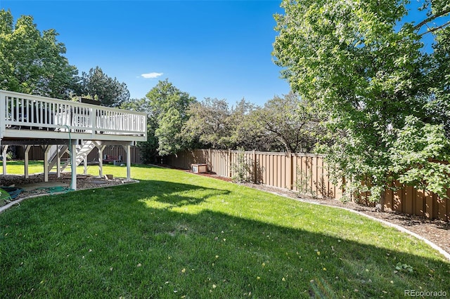 9924 Silver Maple Way, Highlands Ranch, CO 80129 - fenced backyard featuring a wooden deck and stairs