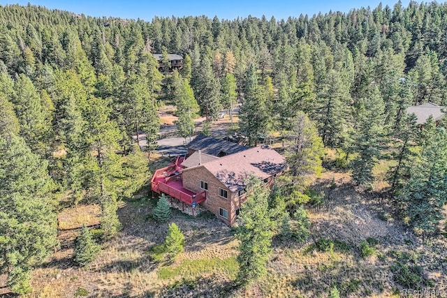 drone / aerial view with a forest view