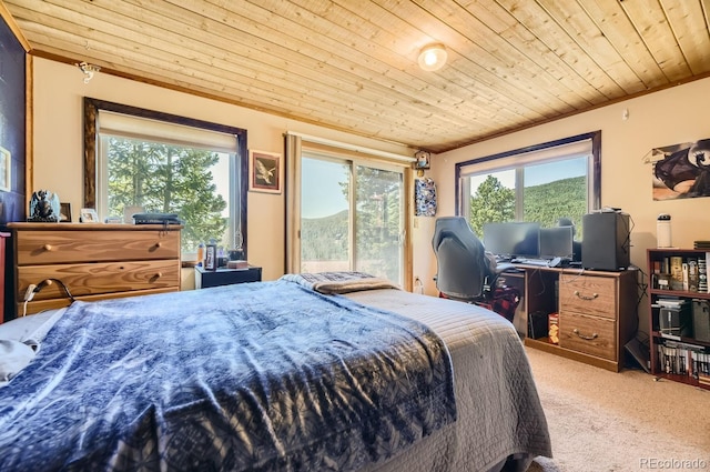 bedroom with wood ceiling and light carpet