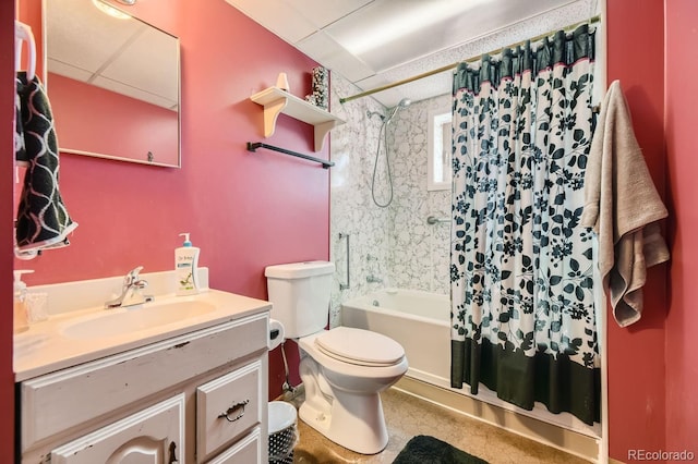 full bathroom with vanity, shower / tub combo, and toilet