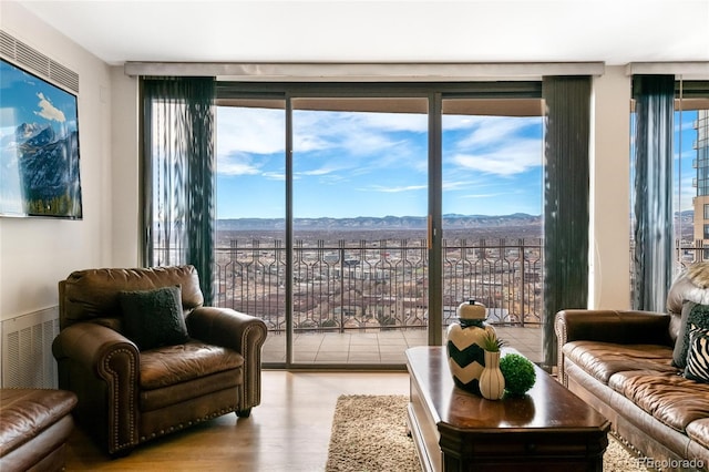 1020 15th St Unit 42A, Denver, CO 80202 - living area with a mountain view and wood finished floors