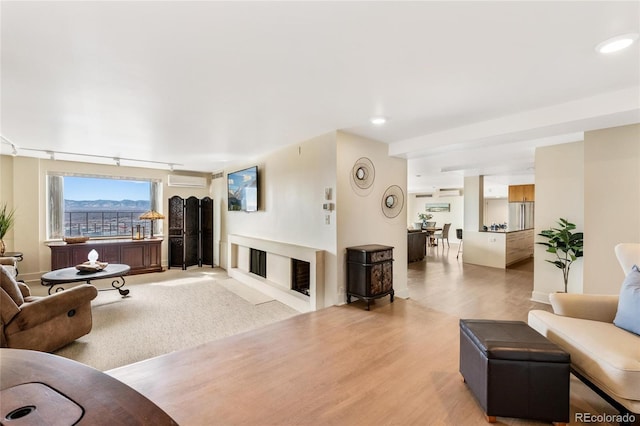 1020 15th St Unit 42A, Denver, CO 80202 - living area with track lighting, wood finished floors, and recessed lighting