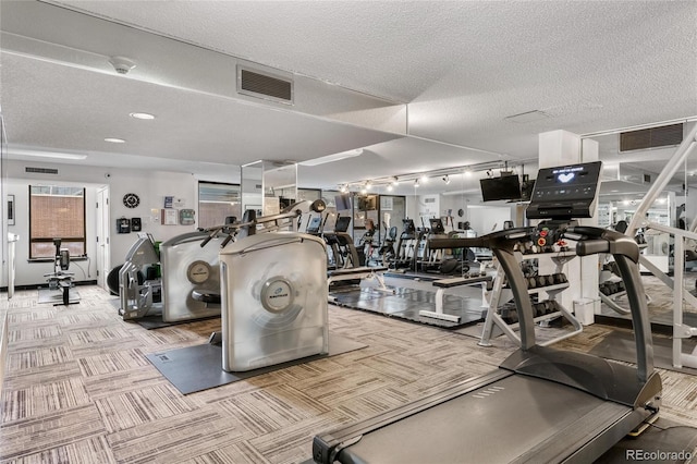 1020 15th St Unit 42A, Denver, CO 80202 - gym featuring carpet flooring, track lighting, and a textured ceiling