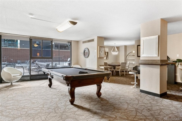 1020 15th St Unit 42A, Denver, CO 80202 - recreation room featuring carpet floors, billiards table, a textured ceiling, and a wall of windows