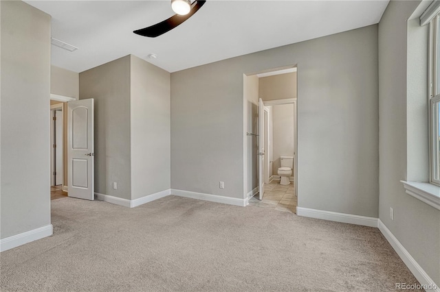 11821 Discovery Ln, Parker, CO 80138 - unfurnished bedroom with carpet floors, ensuite bath, and a ceiling fan