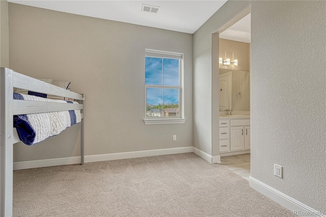 11821 Discovery Ln, Parker, CO 80138 - unfurnished bedroom featuring light carpet and ensuite bath