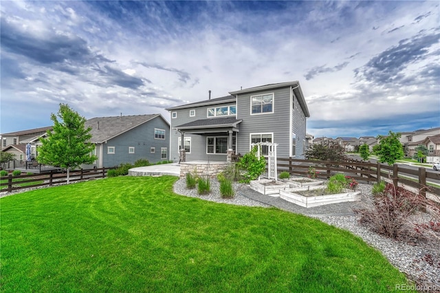 11821 Discovery Ln, Parker, CO 80138 - rear view of house with a patio and a residential view