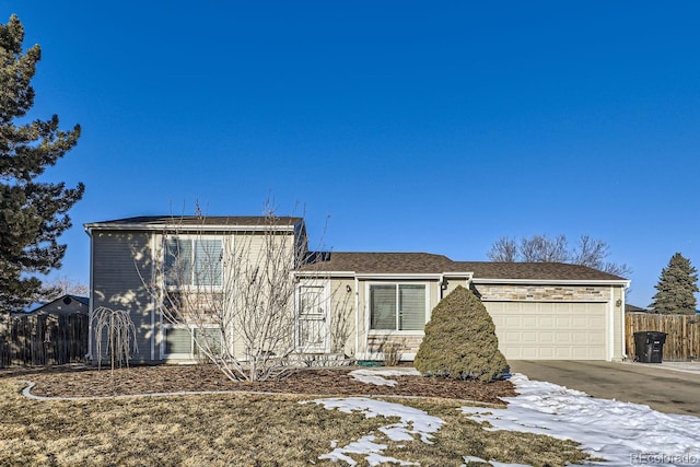 view of front of property featuring a garage