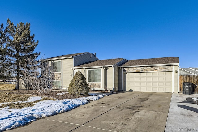 ranch-style house featuring a garage