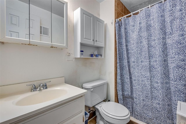 15628 E Girard Pl, Aurora, CO 80013 - bathroom featuring toilet, vanity, and a shower with curtain