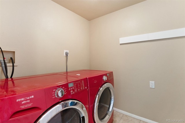 washroom with washing machine and dryer