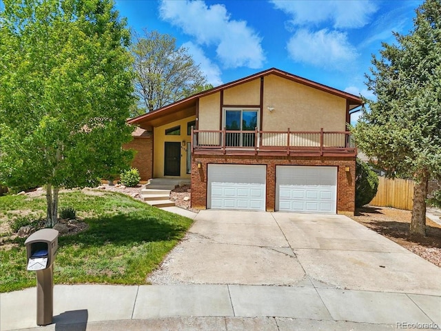4150 Gleneagle Ct, Colorado Springs, CO 80909 - view of front of home featuring stucco siding, concrete driveway, and an attached garage