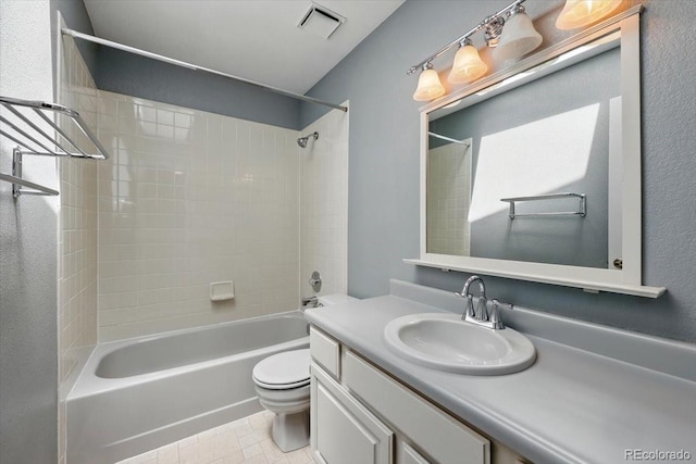 4150 Gleneagle Ct, Colorado Springs, CO 80909 - bathroom featuring vanity, toilet, and shower / bathtub combination