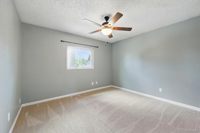4150 Gleneagle Ct, Colorado Springs, CO 80909 - spare room with a ceiling fan, carpet floors, baseboards, and a textured ceiling