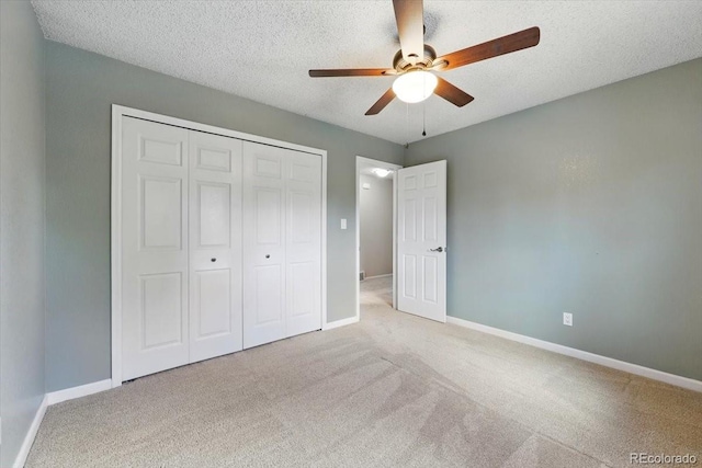4150 Gleneagle Ct, Colorado Springs, CO 80909 - unfurnished bedroom featuring carpet, a closet, baseboards, and a textured ceiling