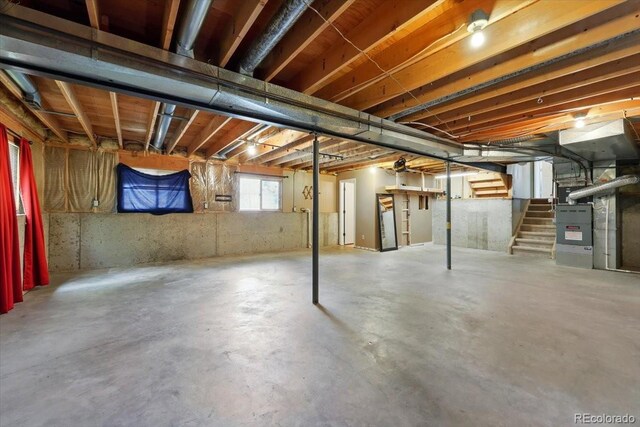 4150 Gleneagle Ct, Colorado Springs, CO 80909 - basement with stairs and heating unit