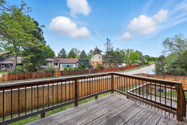 4150 Gleneagle Ct, Colorado Springs, CO 80909 - wooden terrace with a fenced backyard and a residential view