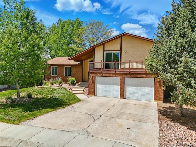 4150 Gleneagle Ct, Colorado Springs, CO 80909 - view of front of house with stucco siding, an attached garage, and driveway