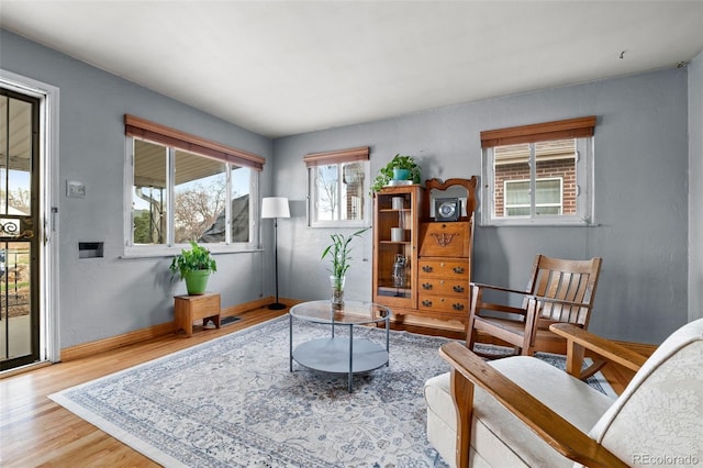 875 S Dale Ct, Denver, CO 80219 - sitting room with wood finished floors and baseboards