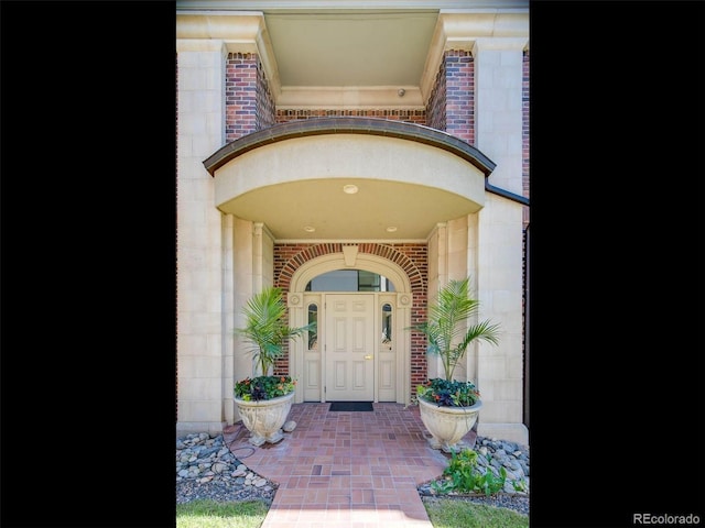 301 Garfield St Unit 1E, Denver, CO 80206 - doorway to property featuring brick siding