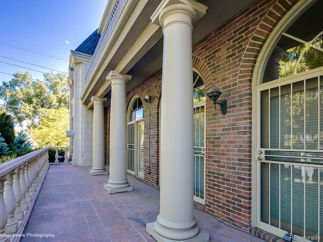 301 Garfield St Unit 1E, Denver, CO 80206 - doorway to property with brick siding