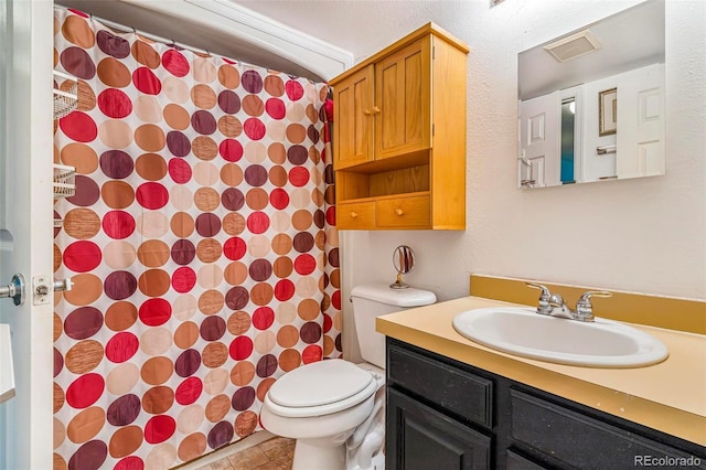12655 E Pacific Cir Unit E, Aurora, CO 80014 - bathroom featuring toilet, vanity, and a shower with curtain