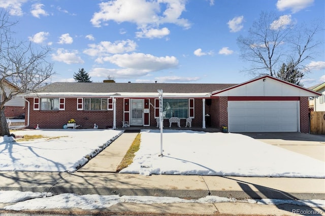 single story home featuring a garage