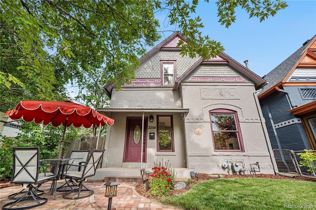 3254 Newton St, Denver, CO 80211 - victorian house featuring a patio area