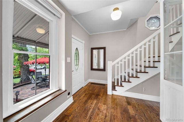 3254 Newton St, Denver, CO 80211 - foyer featuring healthy amount of natural light, stairway, wood finished floors, and crown molding
