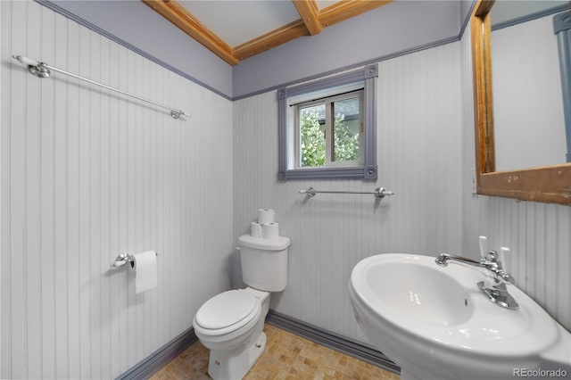 3254 Newton St, Denver, CO 80211 - bathroom with toilet and beam ceiling