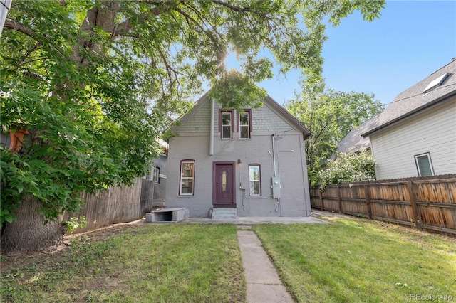 3254 Newton St, Denver, CO 80211 - view of front facade featuring a fenced backyard and brick siding