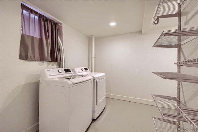 laundry room with washer and dryer