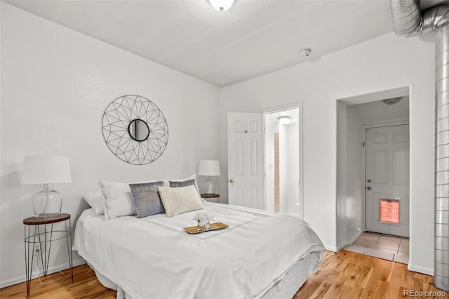 bedroom featuring hardwood / wood-style floors