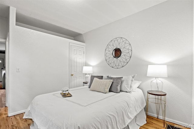 bedroom featuring light wood-type flooring