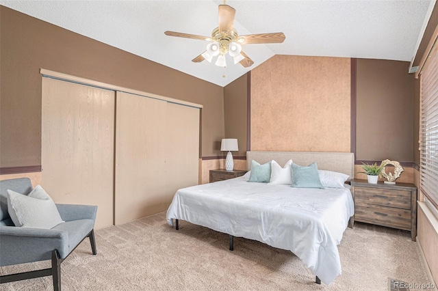 10152 Telluride St, Littleton, CO 80125 - carpeted bedroom featuring a closet, lofted ceiling, and a ceiling fan
