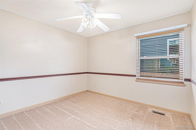 10152 Telluride St, Littleton, CO 80125 - unfurnished room featuring carpet floors, a textured ceiling, and ceiling fan
