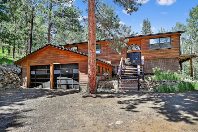 11701 Spruce Canyon Cir, Golden, CO 80403 - view of front of property with an attached garage and driveway