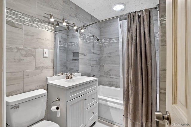11701 Spruce Canyon Cir, Golden, CO 80403 - full bathroom with shower / bath combo, vanity, and tile walls