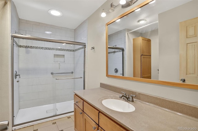11701 Spruce Canyon Cir, Golden, CO 80403 - full bath featuring vanity, a shower stall, and tile patterned floors