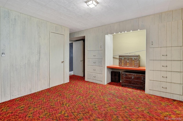 11701 Spruce Canyon Cir, Golden, CO 80403 - carpeted bedroom featuring wooden walls