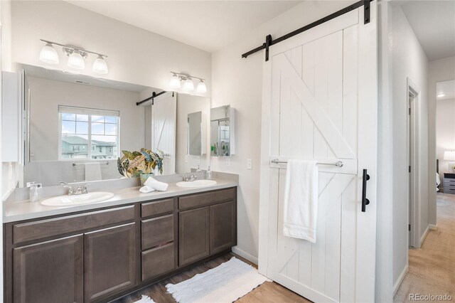 8582 Cheraw St, Littleton, CO 80125 - full bath with double vanity and baseboards