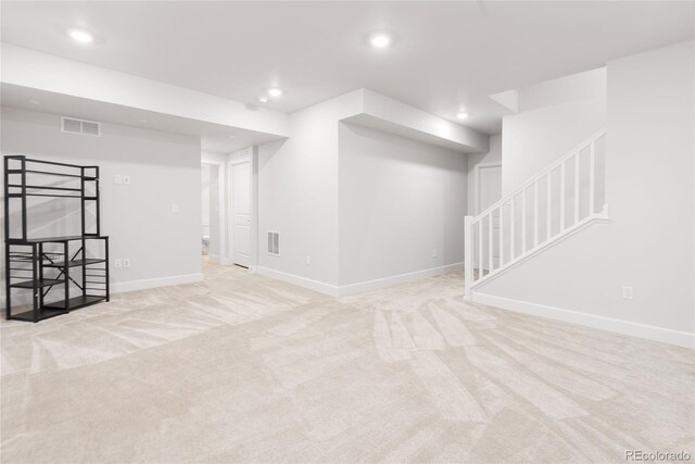 8582 Cheraw St, Littleton, CO 80125 - finished basement with carpet flooring, recessed lighting, and stairs
