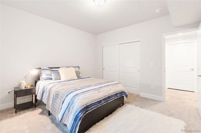 8582 Cheraw St, Littleton, CO 80125 - bedroom featuring light carpet and a closet