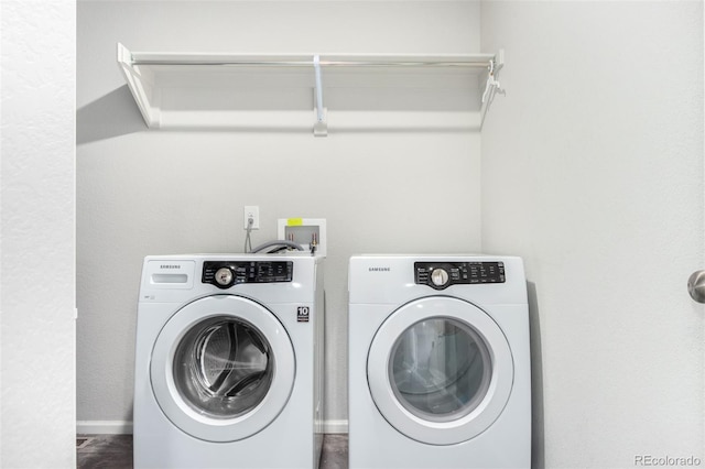 washroom with washer and clothes dryer