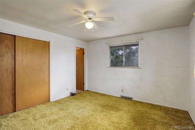 1720 S Balsam St, Lakewood, CO 80232 - unfurnished bedroom featuring carpet flooring, visible vents, a closet, and ceiling fan
