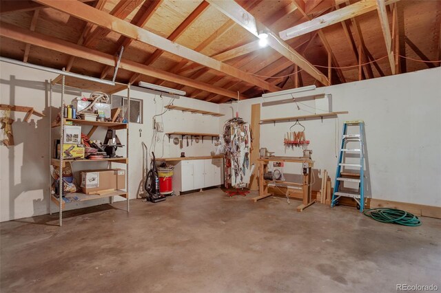 1720 S Balsam St, Lakewood, CO 80232 - garage with a workshop area